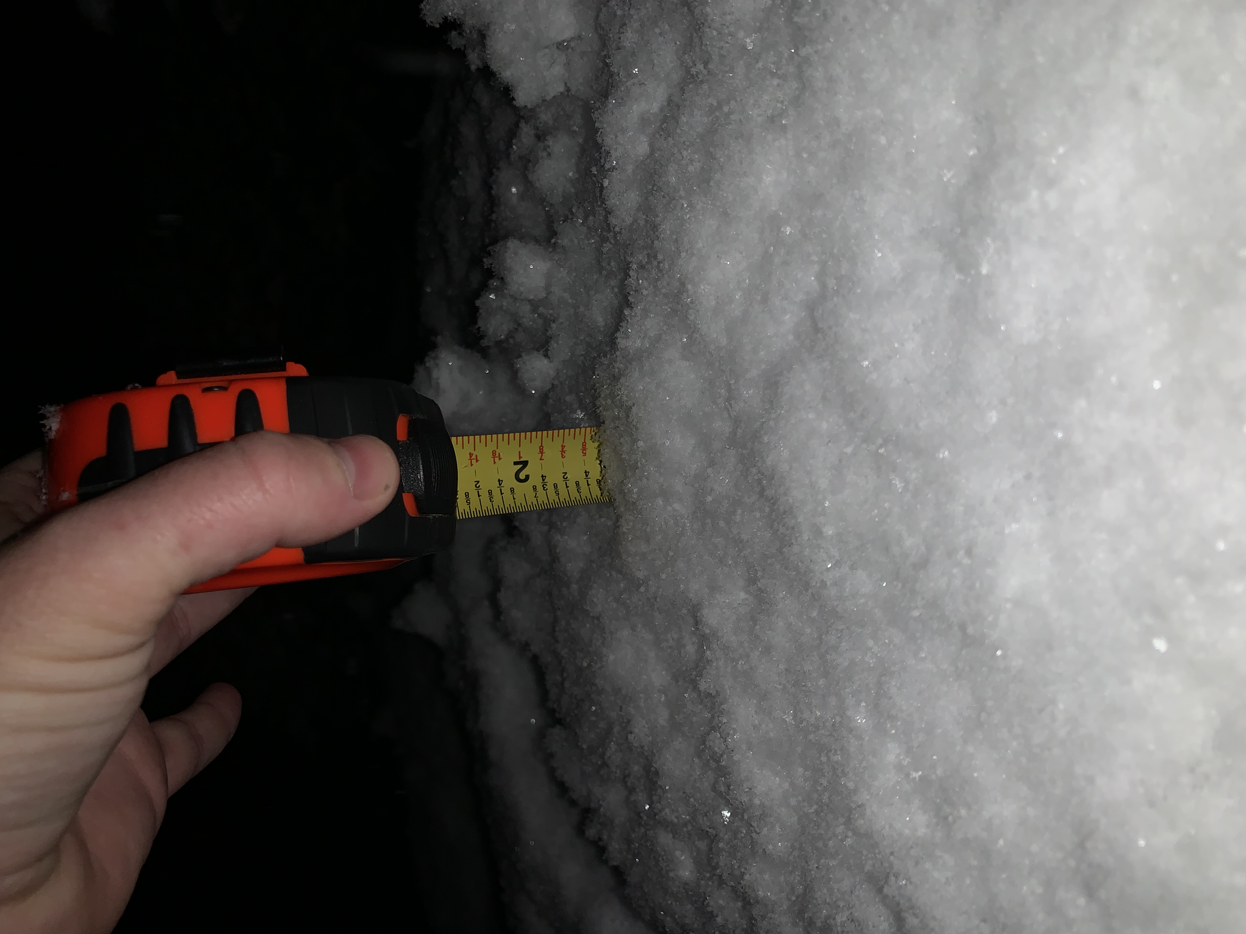 measuring snow depth in Alabama